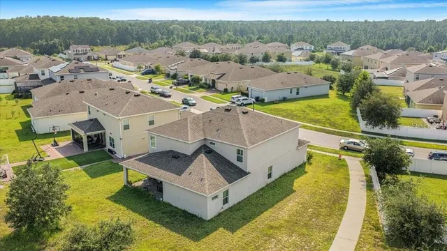 a view of a house with a big yard