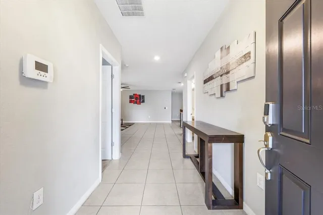 a view of entryway and hall with a window