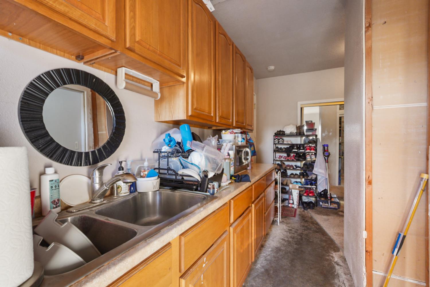561 Church Street Modesto, CA 95357 - Photo 20 of 38 a kitchen with a sink and a refrigerator