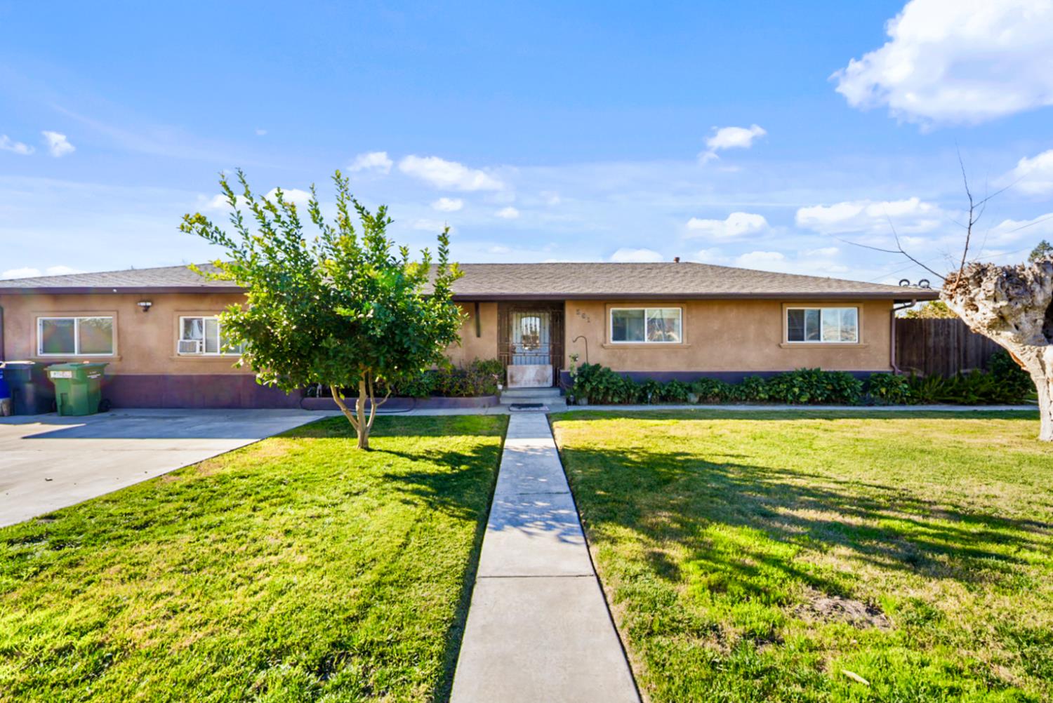 561 Church Street Modesto, CA 95357 - Photo 2 of 38 a house view with a swimming pool