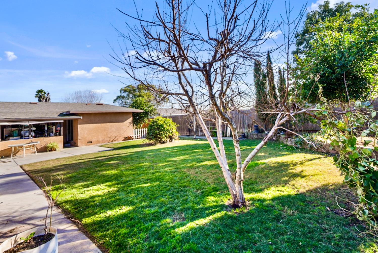 561 Church Street Modesto, CA 95357 - Photo 29 of 38 a front view of a house with garden