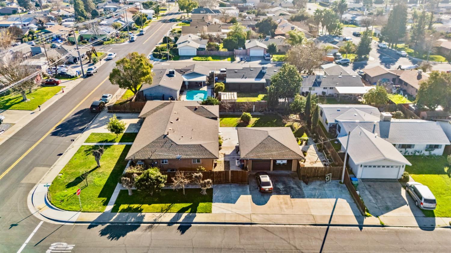 561 Church Street Modesto, CA 95357 - Photo 3 of 38 an aerial view of a swimming pool
