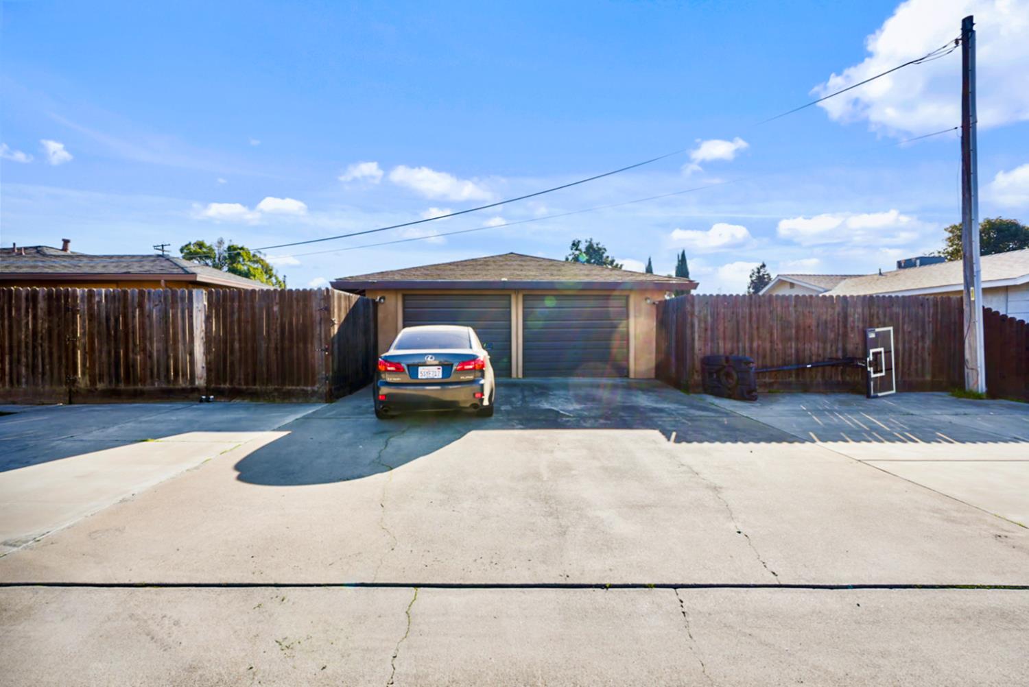 561 Church Street Modesto, CA 95357 - Photo 32 of 38 a car parked on the side of a road