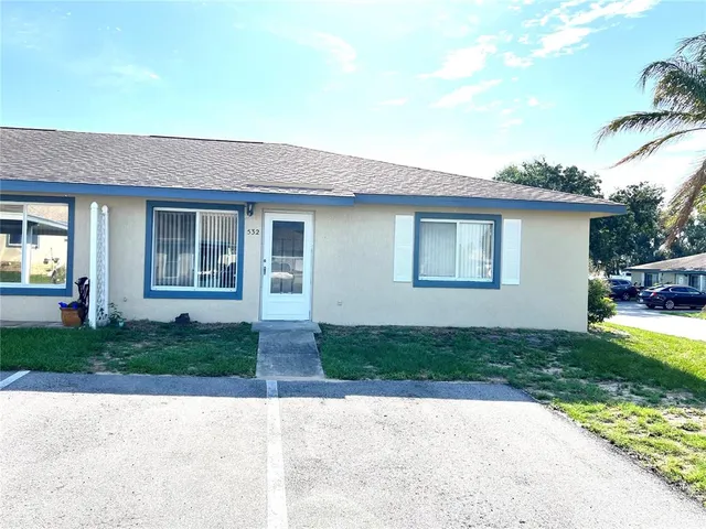 a view of backyard of a house