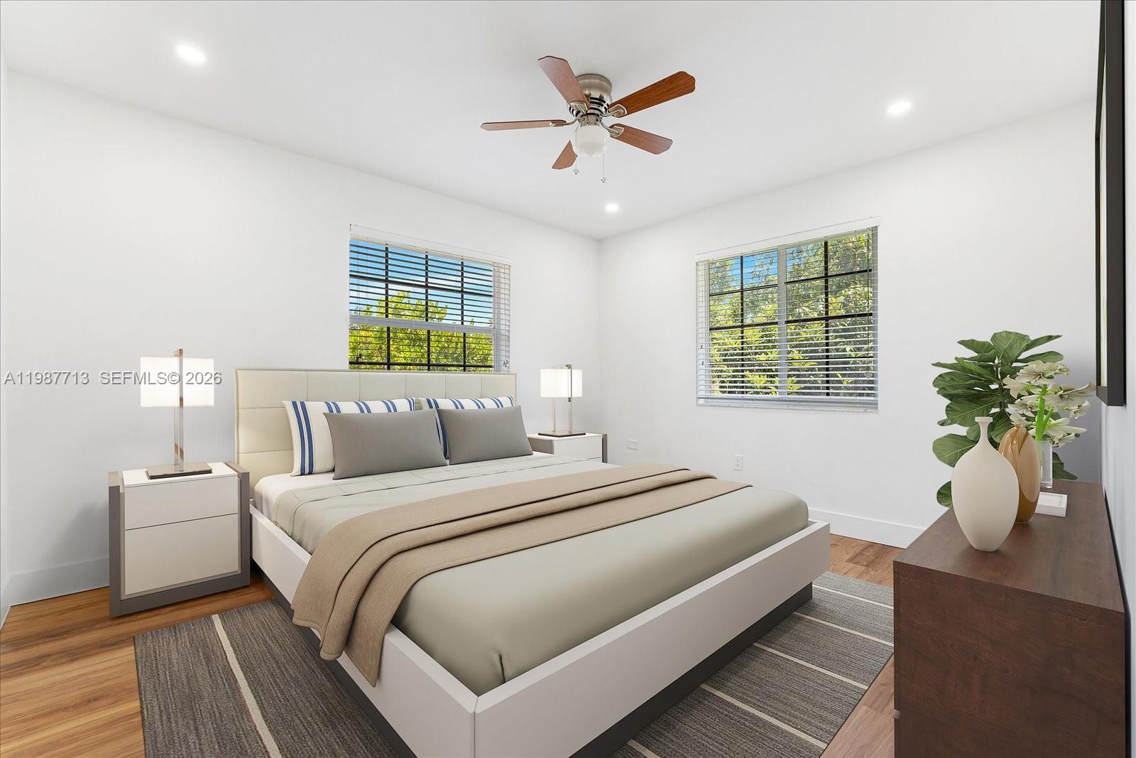 3619 South Le Jeune Road, Unit 1 Coral Gables, FL 33134 - Photo 13 of 17 a bedroom with bed and a window