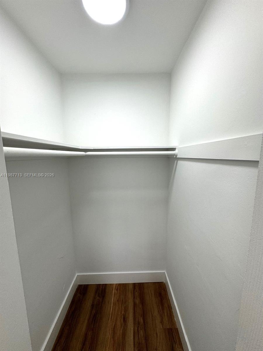 3619 South Le Jeune Road, Unit 1 Coral Gables, FL 33134 - Photo 16 of 17 a view of a room with wooden floor