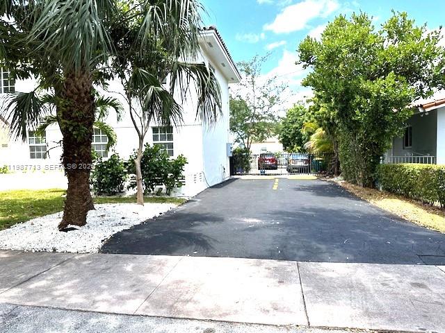 3619 South Le Jeune Road, Unit 1 Coral Gables, FL 33134 - Photo 17 of 17 a view of a street with a tree on the side of the road