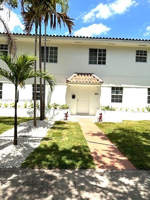 3619 South Le Jeune Road, Unit 1 Coral Gables, FL 33134 - Photo 2 of 17 a front view of a house with garden