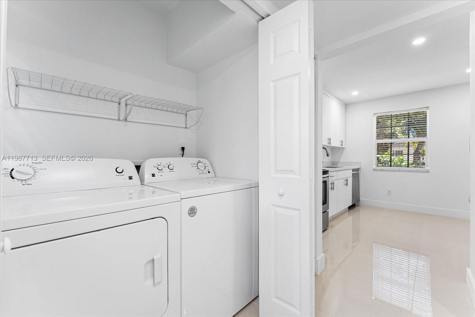 3619 South Le Jeune Road, Unit 1 Coral Gables, FL 33134 - Photo 8 of 17 a utility room with dryer and washer
