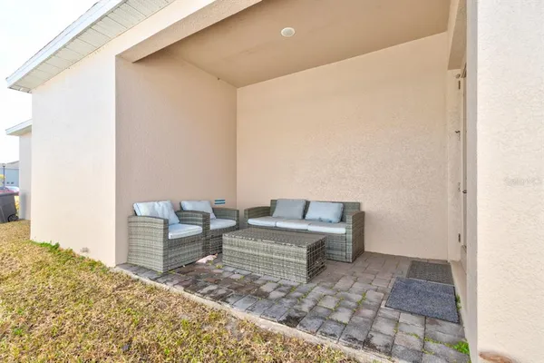 a view of a bedroom with furniture