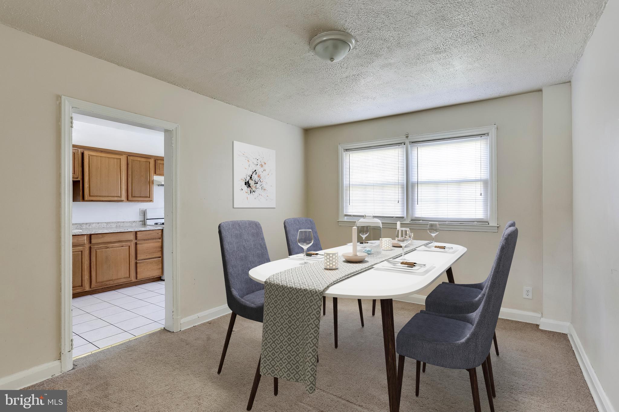 1622 Winford Road Baltimore, MD 21239 - Photo 10 of 37 Virtually staged dining room