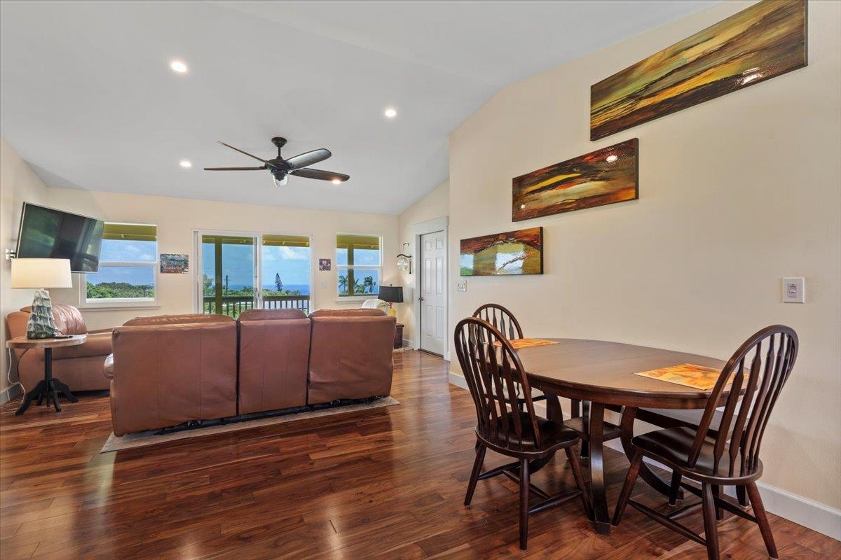 139 Pauwela Road Haiku, HI 96708 - Photo 11 of 42 a view of a dining room with furniture and wooden floor