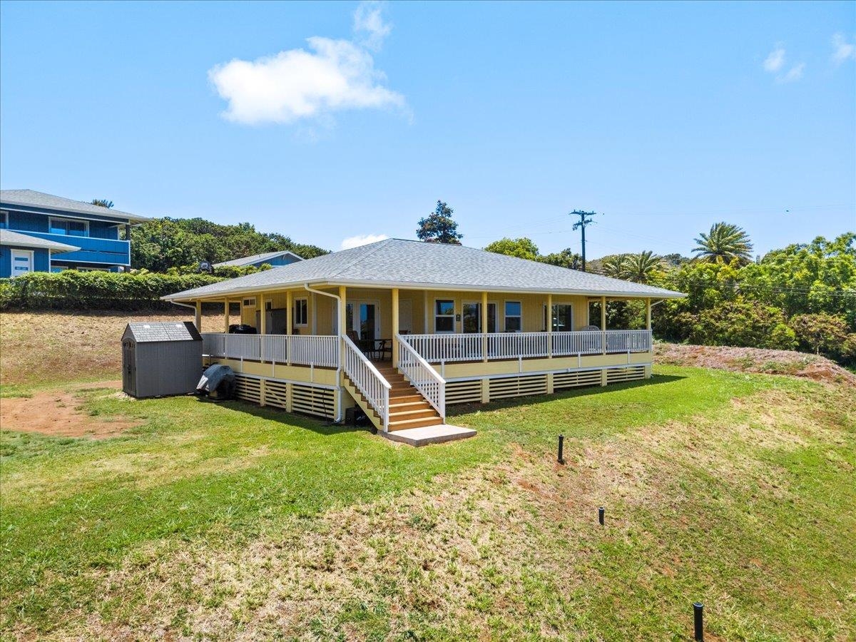 139 Pauwela Road Haiku, HI 96708 - Photo 2 of 42 a view of a house with a yard balcony and swimming pool
