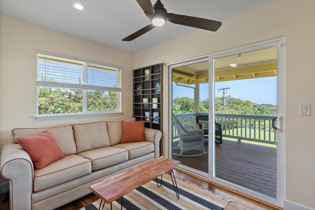 139 Pauwela Road Haiku, HI 96708 - Photo 23 of 42 a living room with furniture and a large window