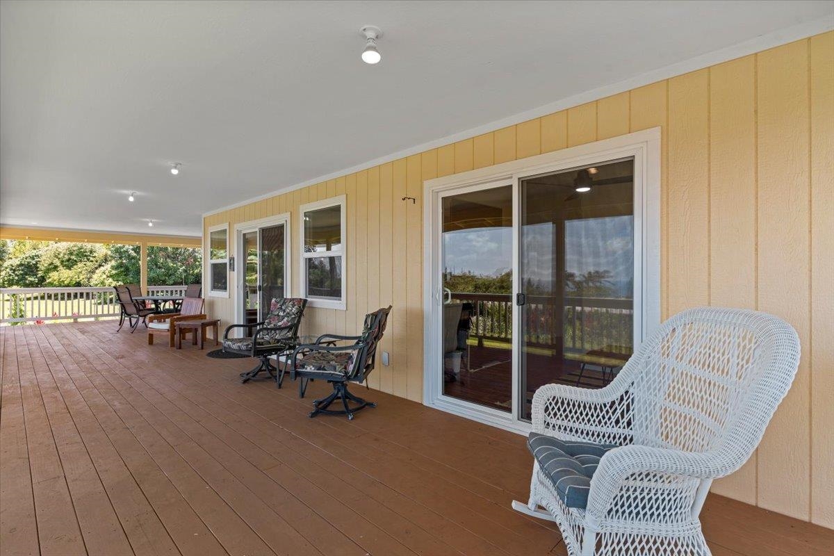 139 Pauwela Road Haiku, HI 96708 - Photo 26 of 42 a living room with furniture and a large window