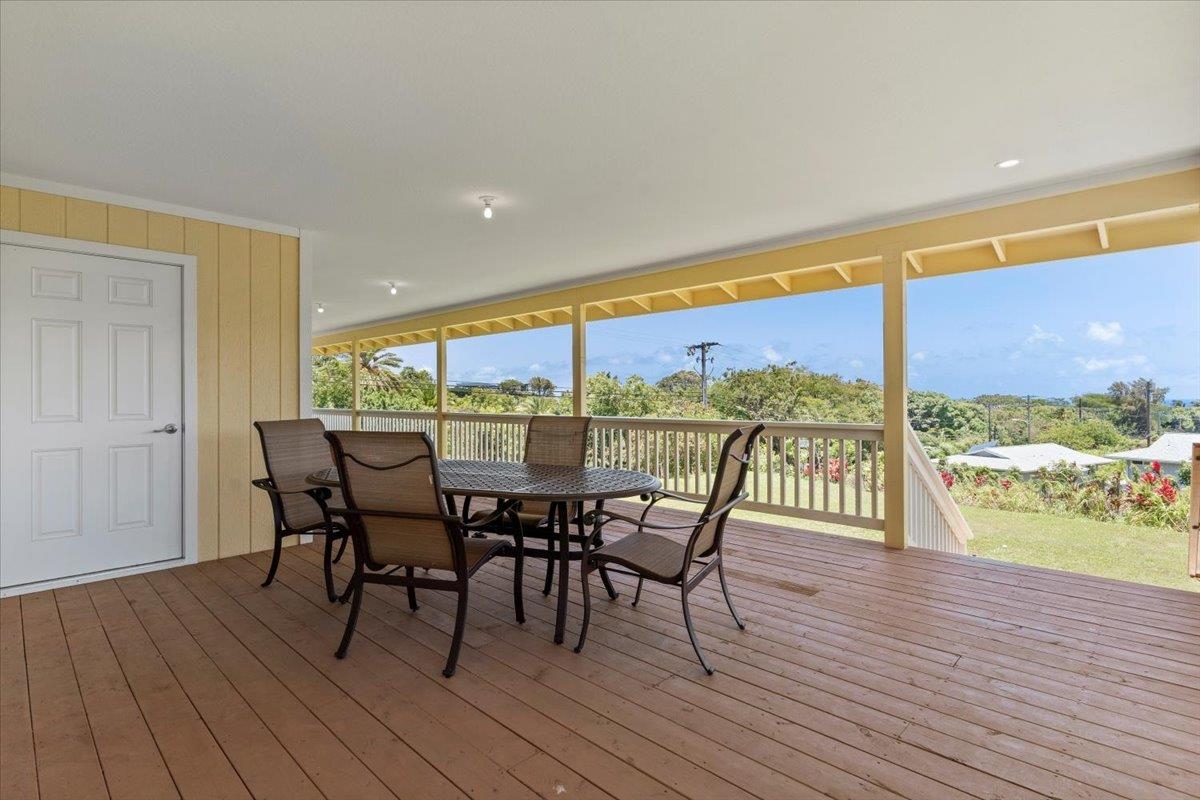 139 Pauwela Road Haiku, HI 96708 - Photo 29 of 42 a view of a dining room with furniture and wooden floor