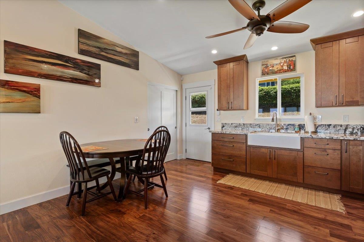 139 Pauwela Road Haiku, HI 96708 - Photo 10 of 42 a view of a dining room with furniture window and wooden floor