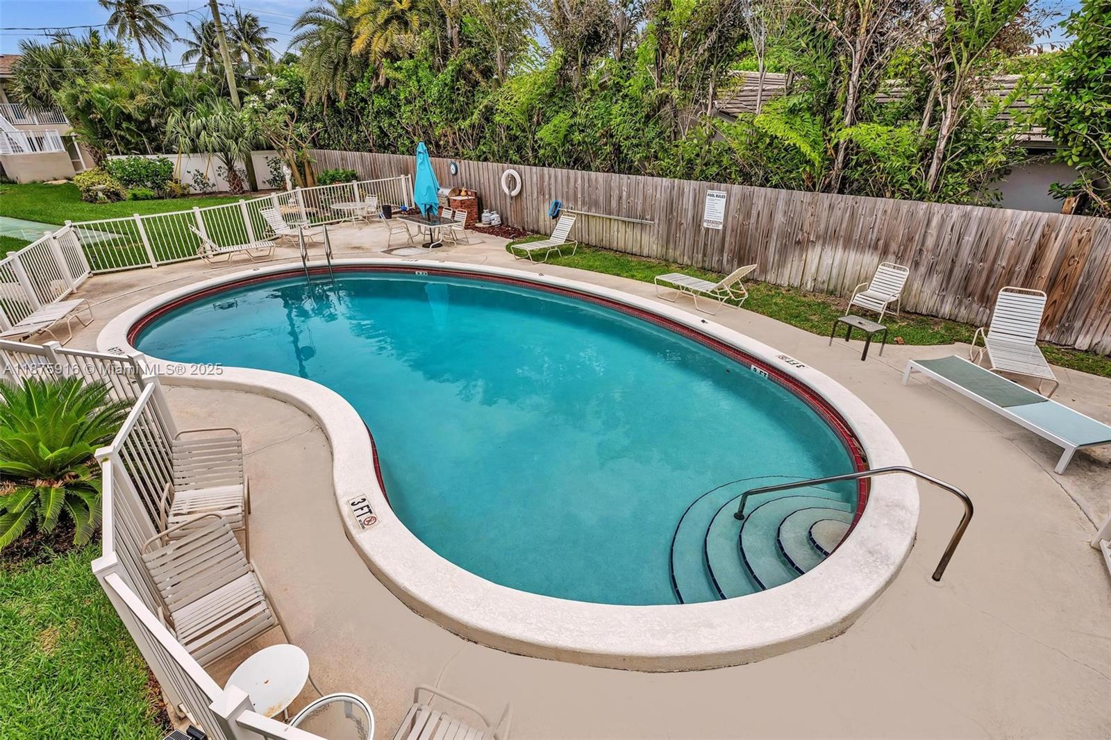 2501 North Ocean Boulevard, Unit 18 Pompano Beach, FL 33062 - Photo 2 of 36 a view of outdoor sitting area with furniture
