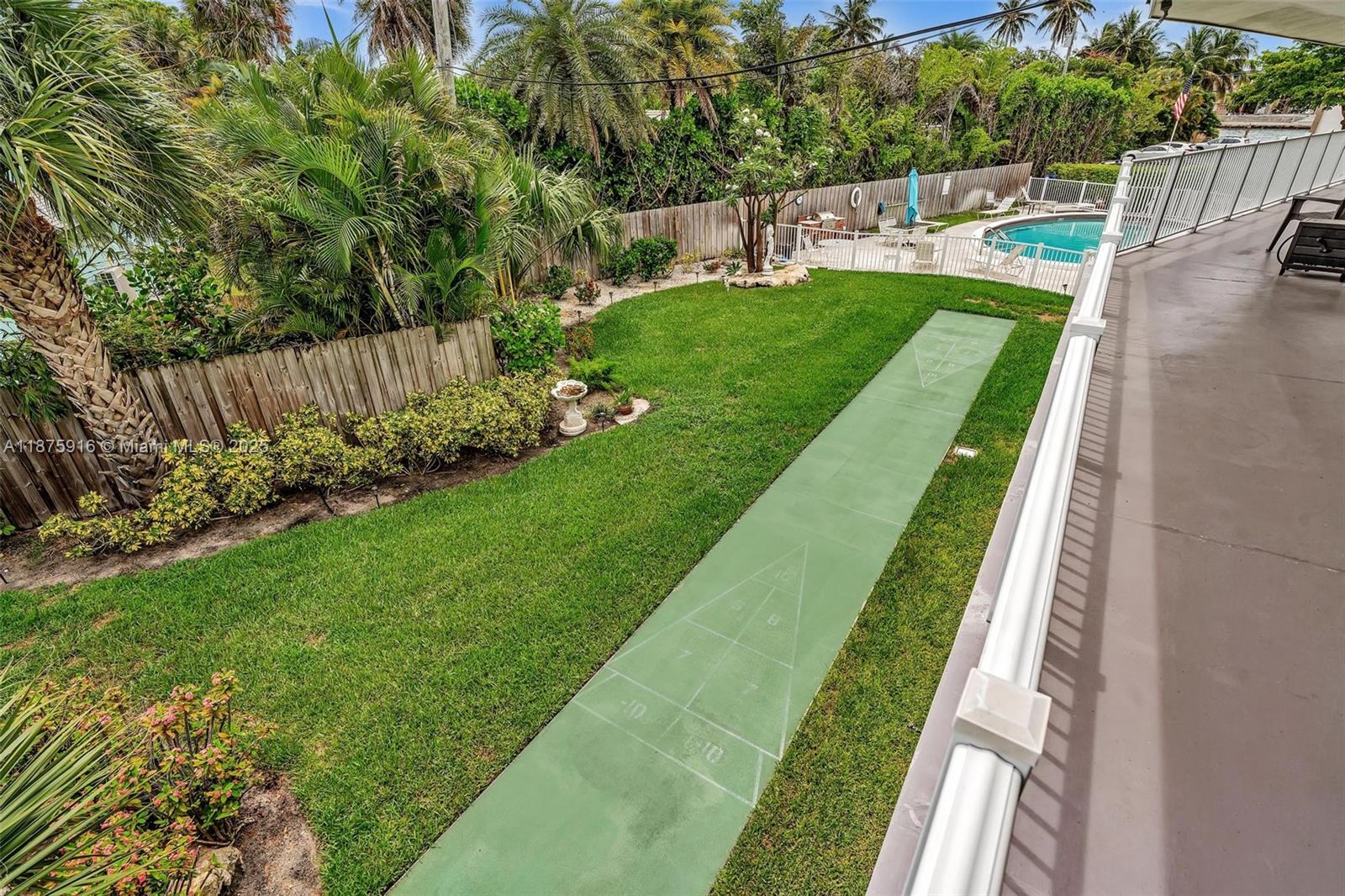 2501 North Ocean Boulevard, Unit 18 Pompano Beach, FL 33062 - Photo 31 of 36 a view of yard with seating area