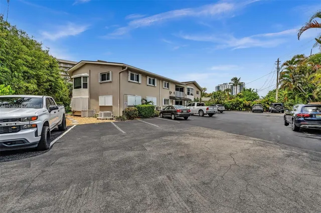a car parked in front of a house