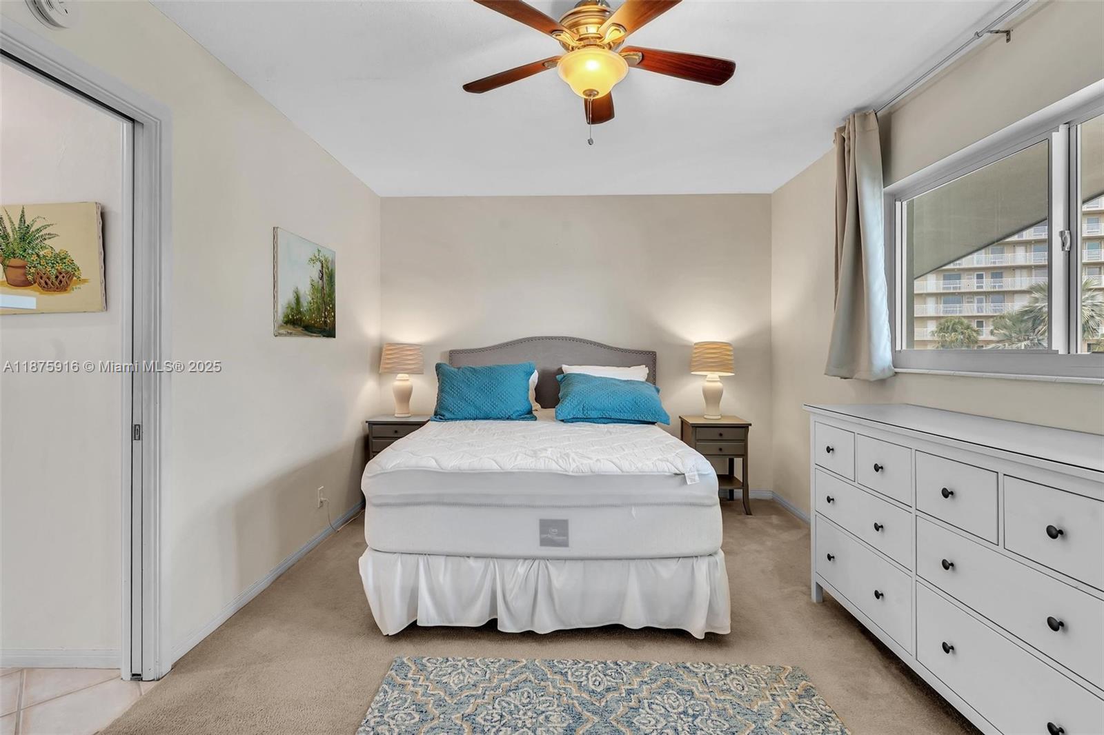 2501 North Ocean Boulevard, Unit 18 Pompano Beach, FL 33062 - Photo 6 of 36 a bedroom with a bed and window