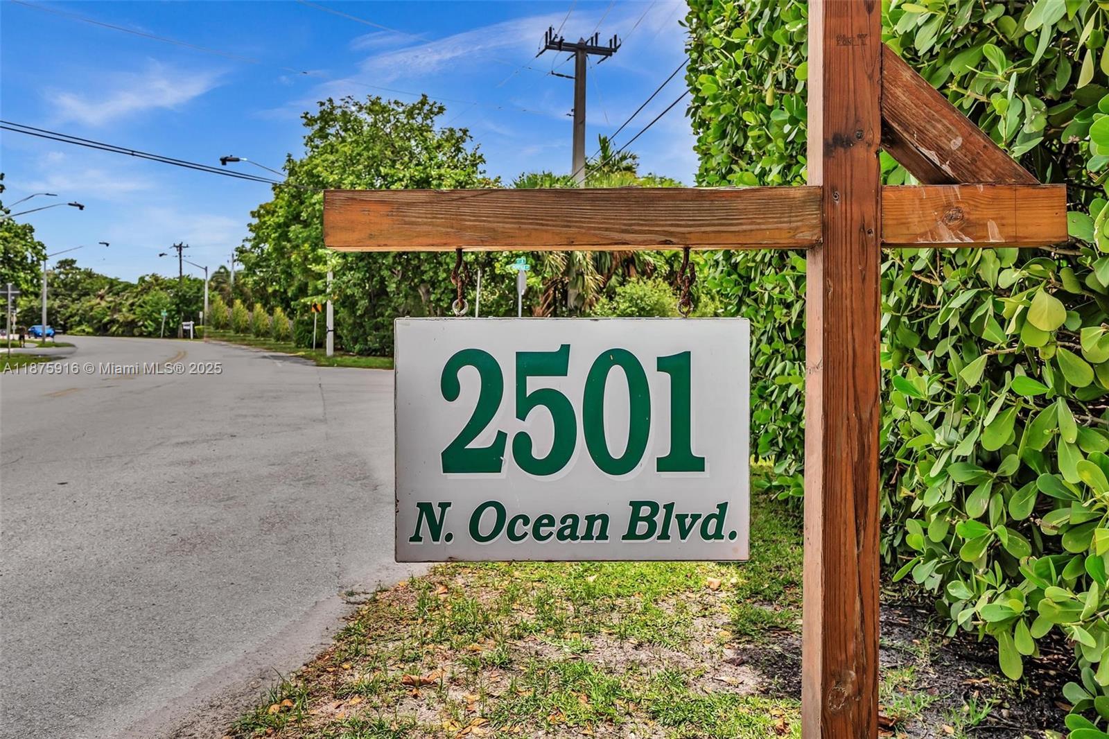 2501 North Ocean Boulevard, Unit 18 Pompano Beach, FL 33062 - Photo 7 of 36 a sign on the side of a building