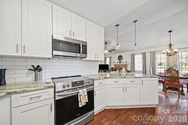 a bedroom with a bed and a table