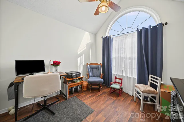 a spacious bathroom with a double vanity sink and a mirror