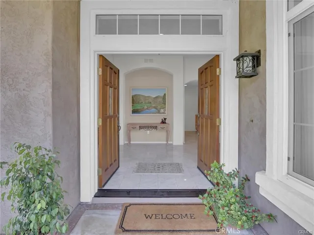 a front view of a house with a glass door