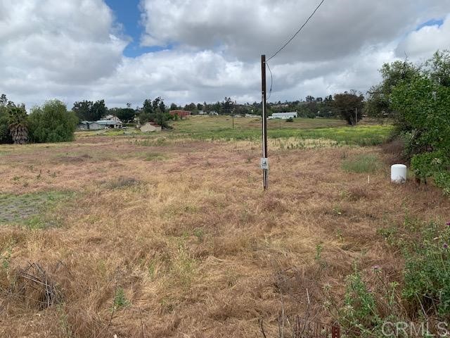 1669 Montecito Road Ramona, CA 92065 - Photo 3 of 9 a view of a golf course with a lake