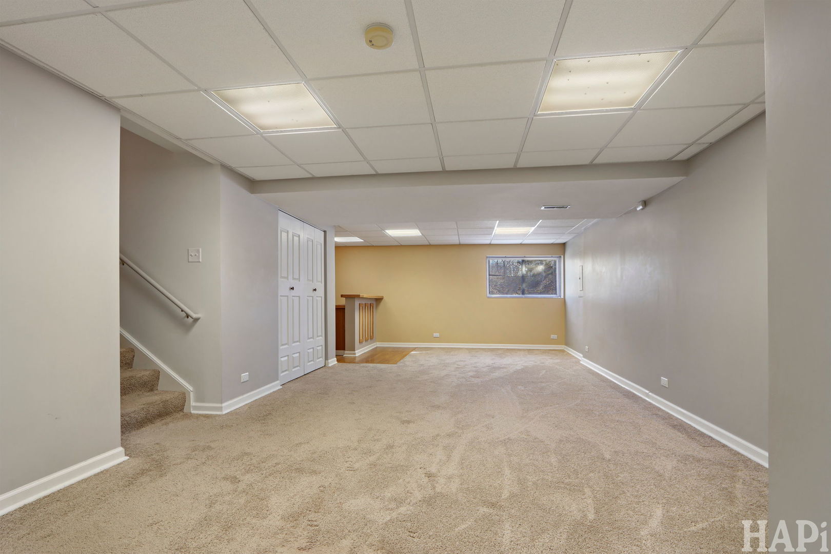 373 Keswick Court, Unit 373 Round Lake, IL 60073 - Photo 20 of 30 an empty room with a empty space and windows