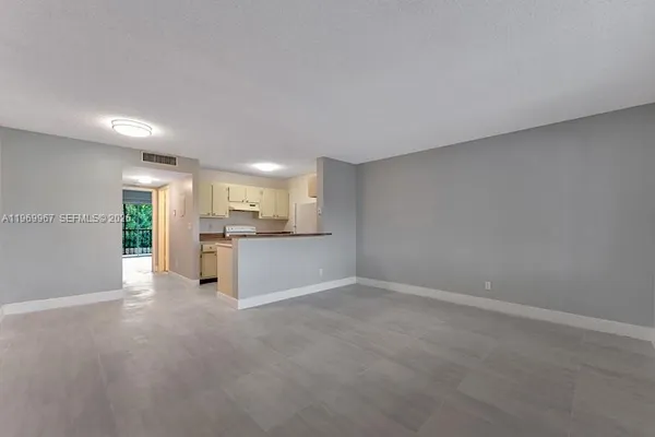 a view of a kitchen with a sink