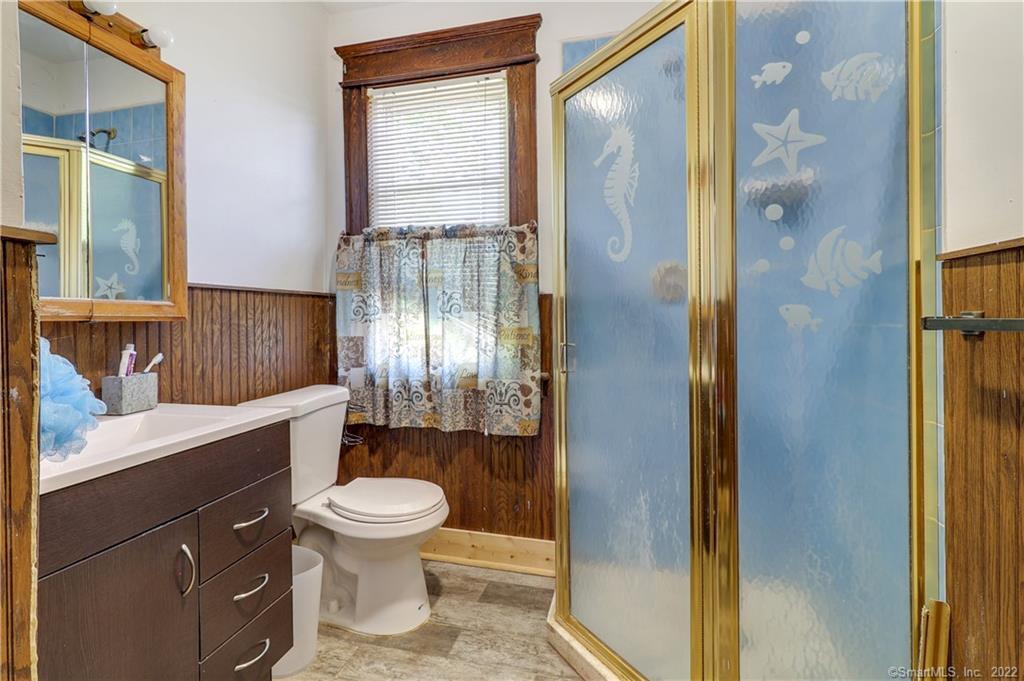 19 5th Street Ansonia, CT 06401 - Photo 31 of 38 a bathroom with a sink toilet and shower