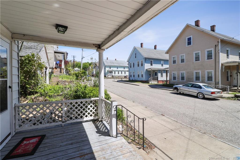 19 5th Street Ansonia, CT 06401 - Photo 5 of 38 a city view with tall buildings and cars parked