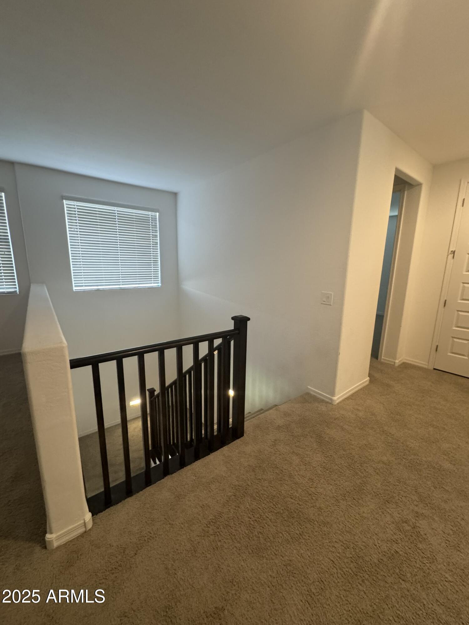 22742 East Domingo Road Queen Creek, AZ 85142 - Photo 17 of 23 a view of a hallway