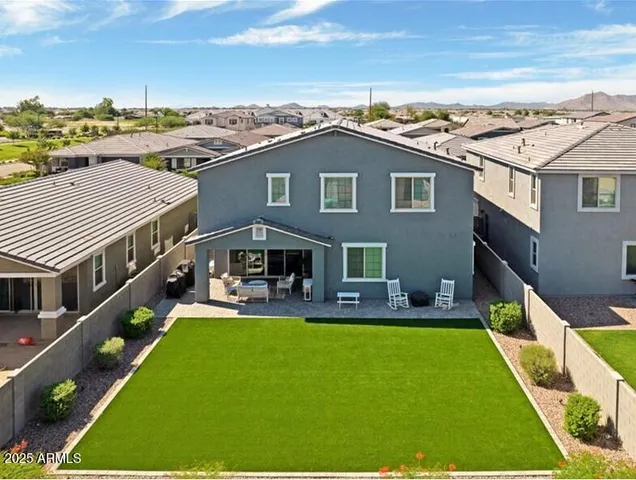a kitchen with stainless steel appliances a refrigerator and a stove