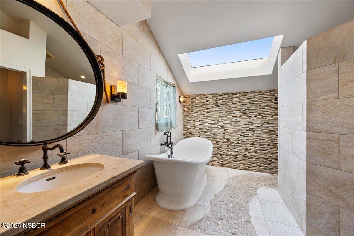 892 Onstott Road Lompoc, CA 93436 - Photo 19 of 40 a bathroom with a sink and a mirror