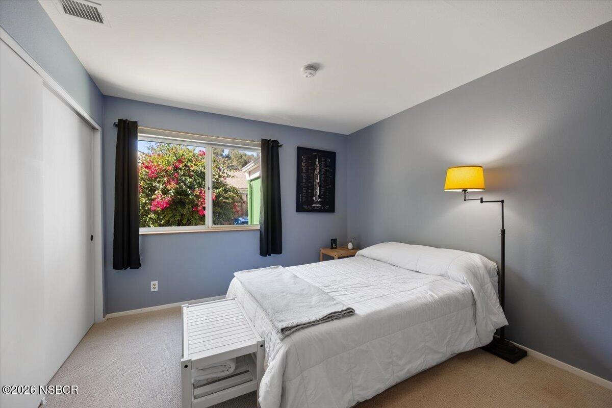 892 Onstott Road Lompoc, CA 93436 - Photo 21 of 40 a bedroom with a bed and window