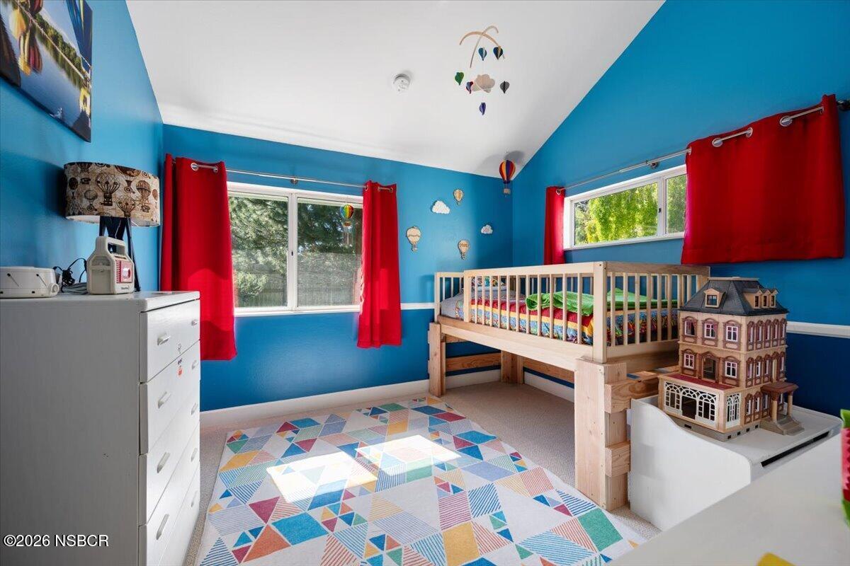 892 Onstott Road Lompoc, CA 93436 - Photo 23 of 40 a bedroom with furniture and a baby crib