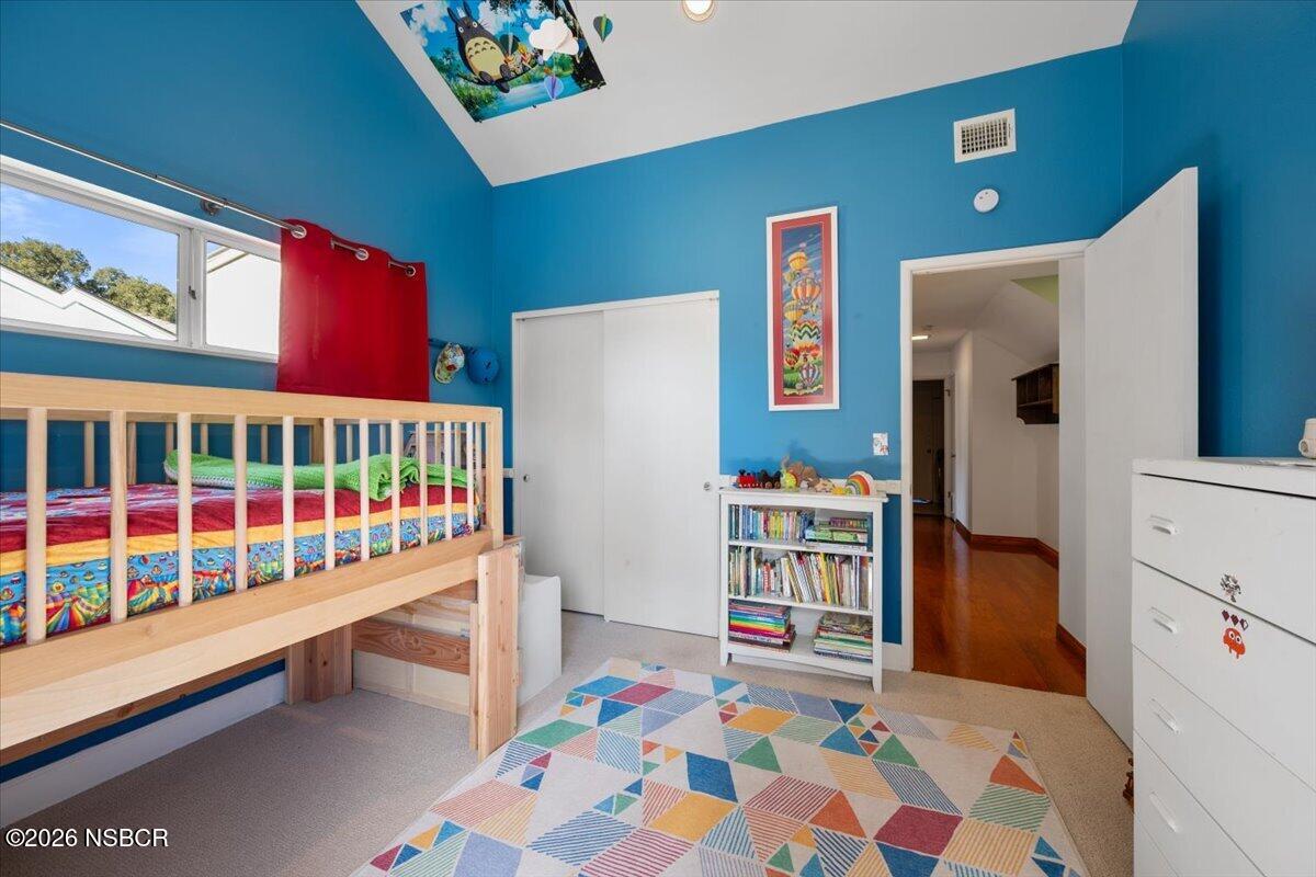 892 Onstott Road Lompoc, CA 93436 - Photo 24 of 40 a bedroom with furniture and a baby crib
