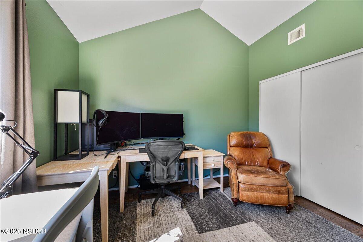 892 Onstott Road Lompoc, CA 93436 - Photo 27 of 40 a room with furniture and a flat screen tv