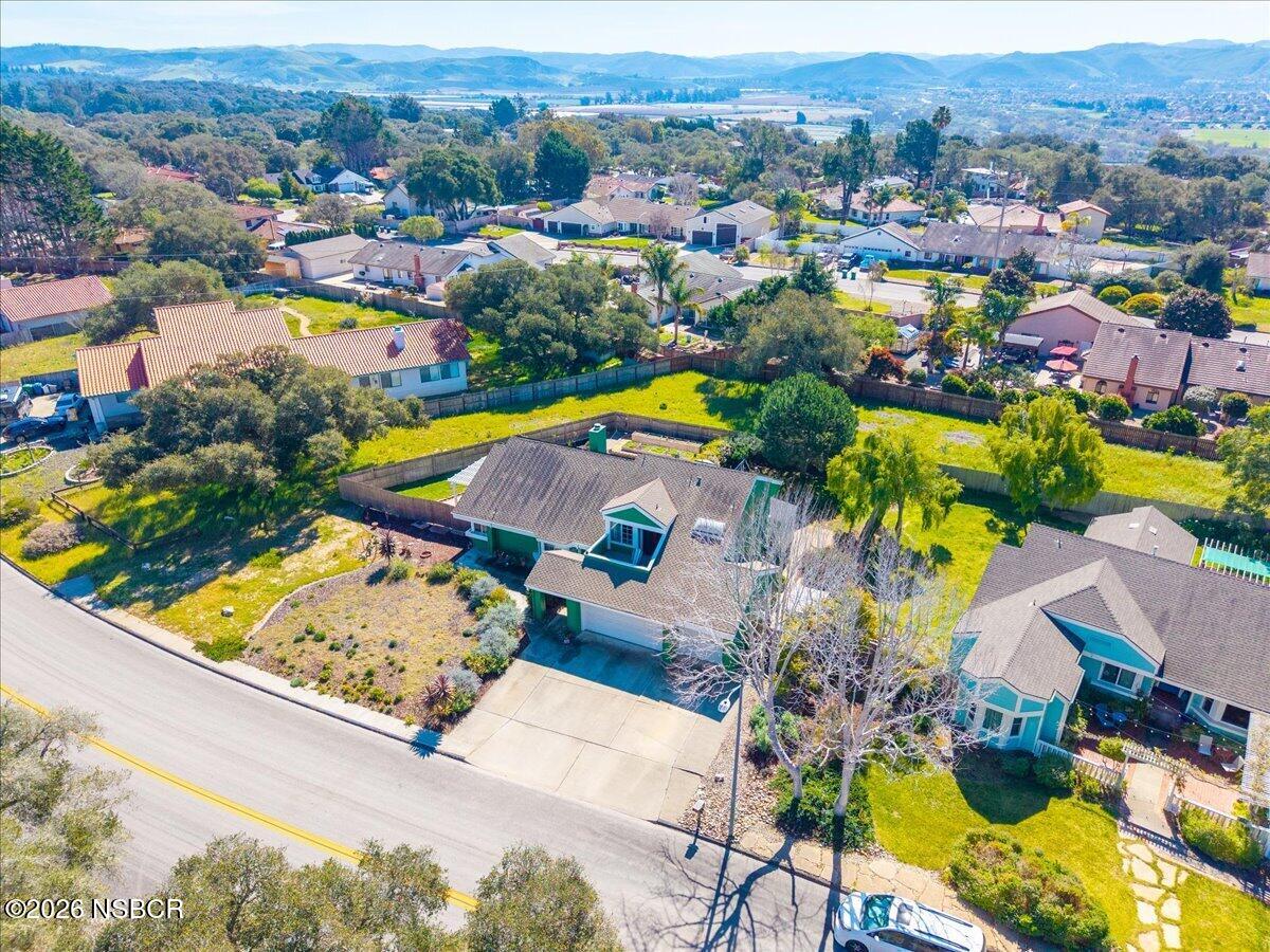 892 Onstott Road Lompoc, CA 93436 - Photo 36 of 40 an aerial view of residential houses with swimming pool and ocean view