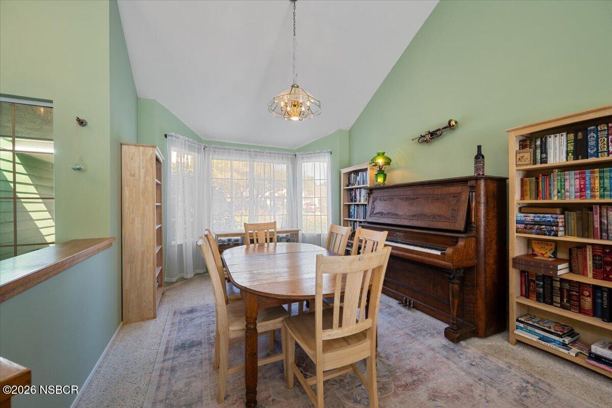 892 Onstott Road Lompoc, CA 93436 - Photo 7 of 40 a view of a dining room with furniture window and wooden floor