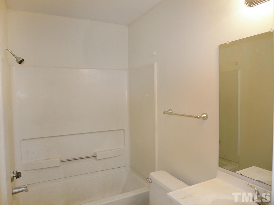 138 Johnson Street, Unit A Chapel Hill, NC 27516 - Photo 12 of 20 a bathroom with a bathtub