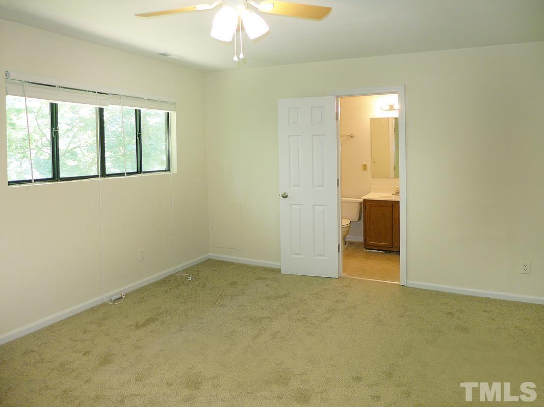 138 Johnson Street, Unit A Chapel Hill, NC 27516 - Photo 13 of 20 an empty room with a bathroom