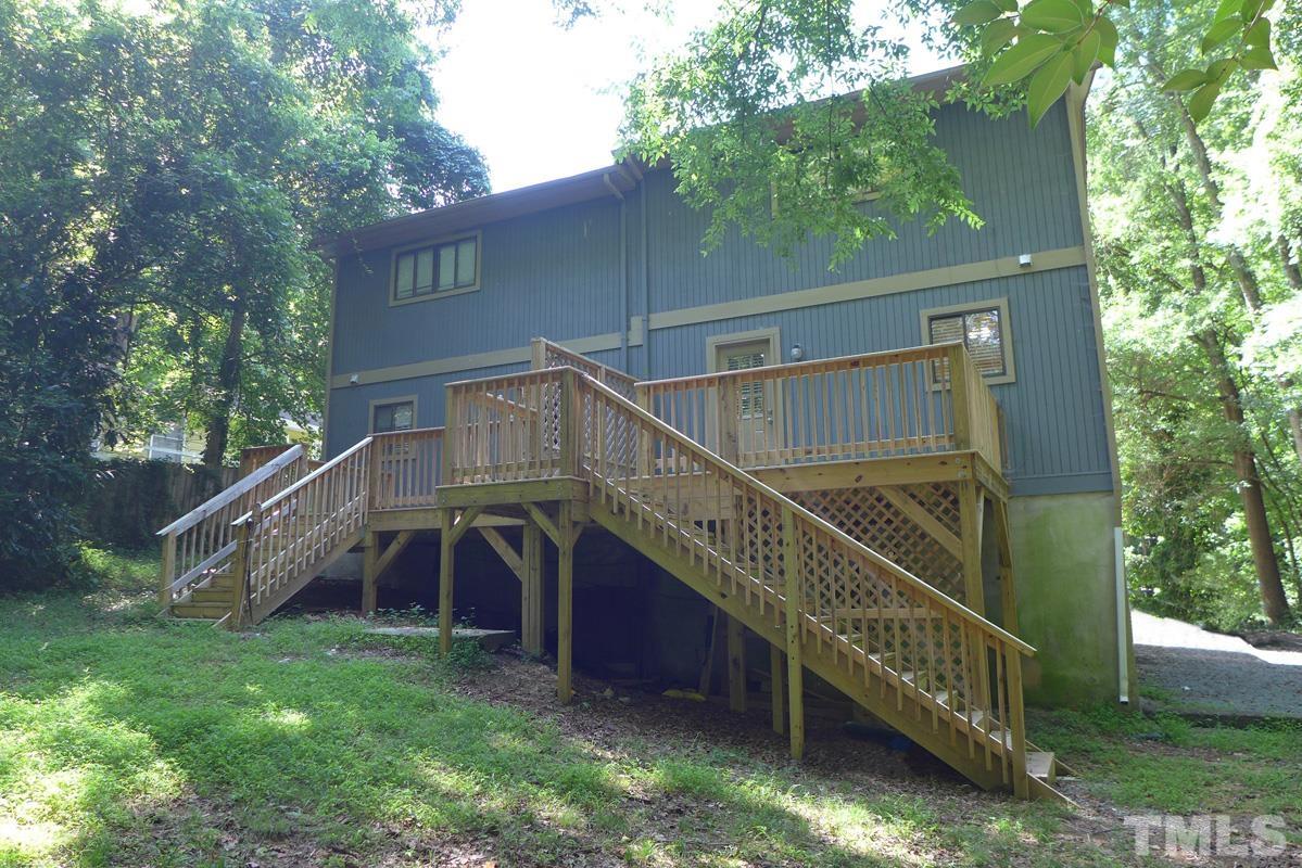 138 Johnson Street, Unit A Chapel Hill, NC 27516 - Photo 20 of 20 a view of a house with a yard