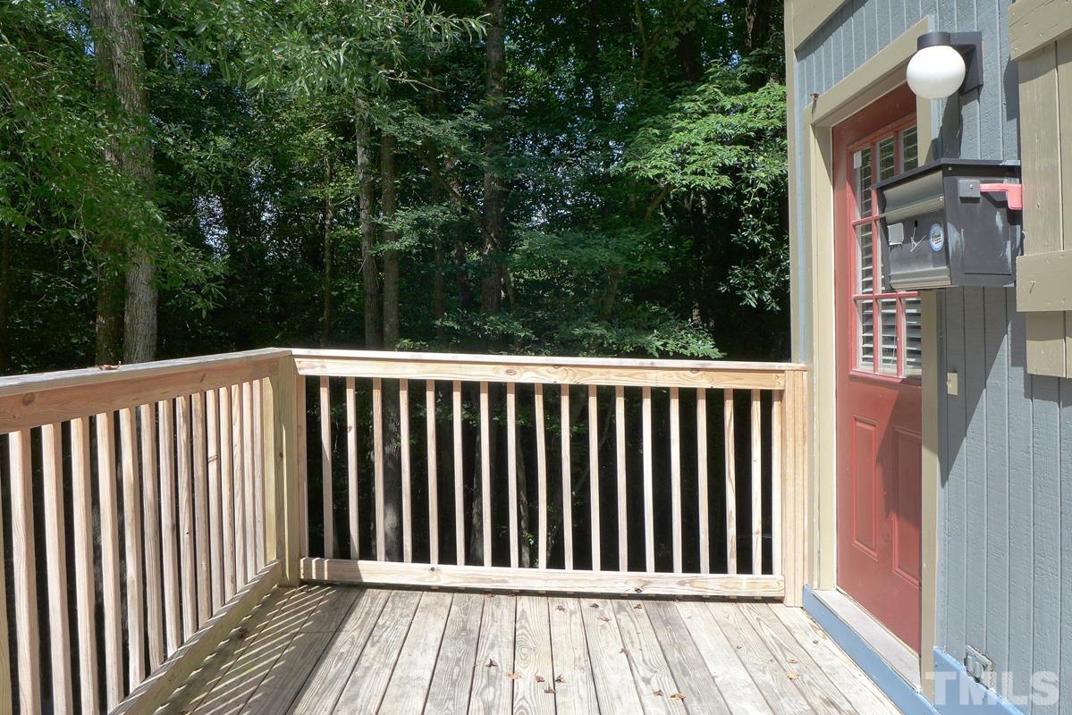 138 Johnson Street, Unit A Chapel Hill, NC 27516 - Photo 2 of 20 a view of a wooden fence