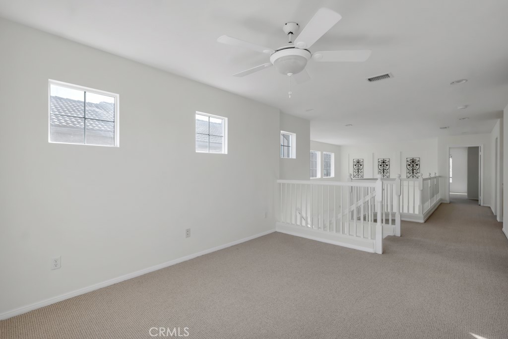 11205 Salerno Porter Ranch Porter Ranch, CA 91326 - Photo 19 of 43 a view of an empty room with white walls