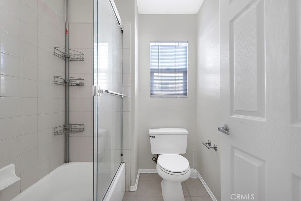 11205 Salerno Porter Ranch Porter Ranch, CA 91326 - Photo 34 of 43 a white toilet sitting next to a bath tub