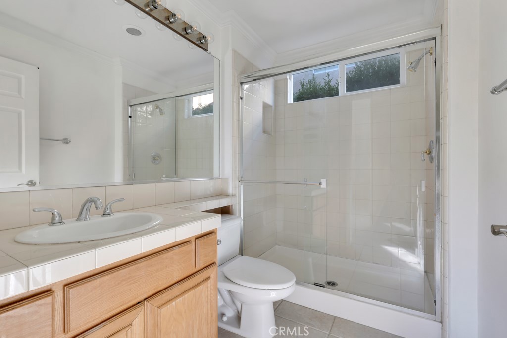 11205 Salerno Porter Ranch Porter Ranch, CA 91326 - Photo 37 of 43 a bathroom with a sink toilet and shower
